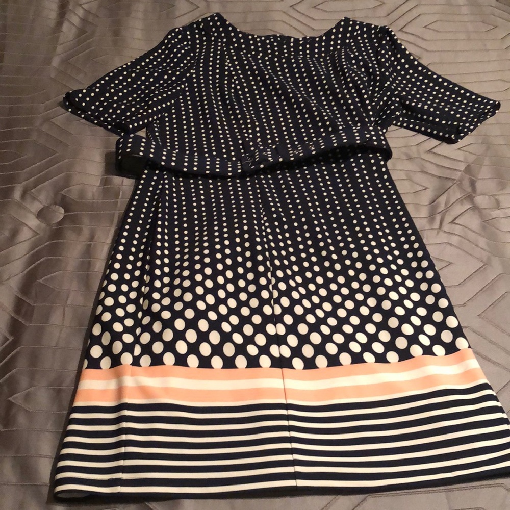 Navy blue polka dot dress with matching adjustable belt. Size 16
